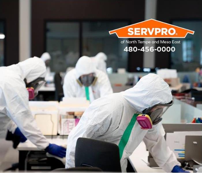SERVPRO professionals are cleaning an area exposed to biohazards. 