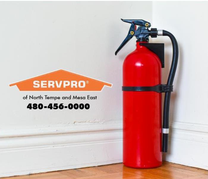 A portable fire extinguisher in a home. 
